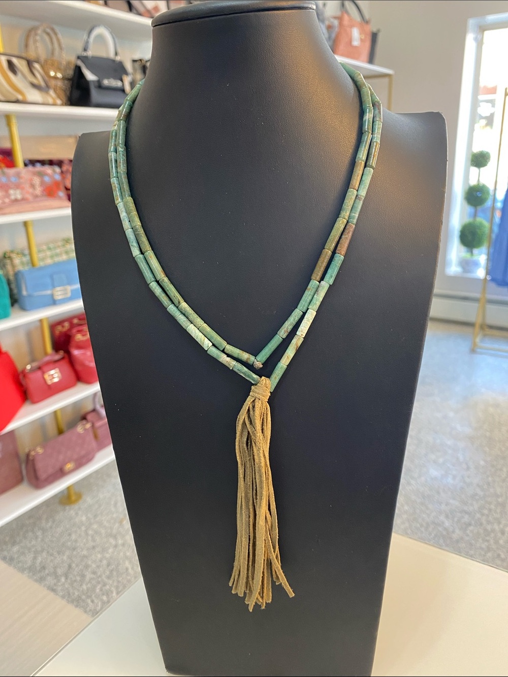 Green stone necklace with tassel